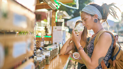 two female tourists shopping at legal cannabis shop in pattaya thailand