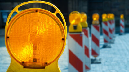 Warning lights at a construction site on the street