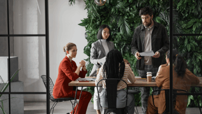 diverse group of business people meeting at table in modern office