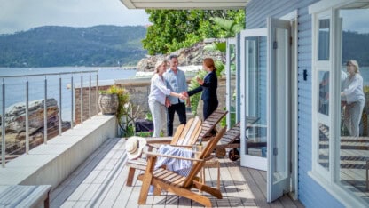 Real estate agent showing showing property to an investor